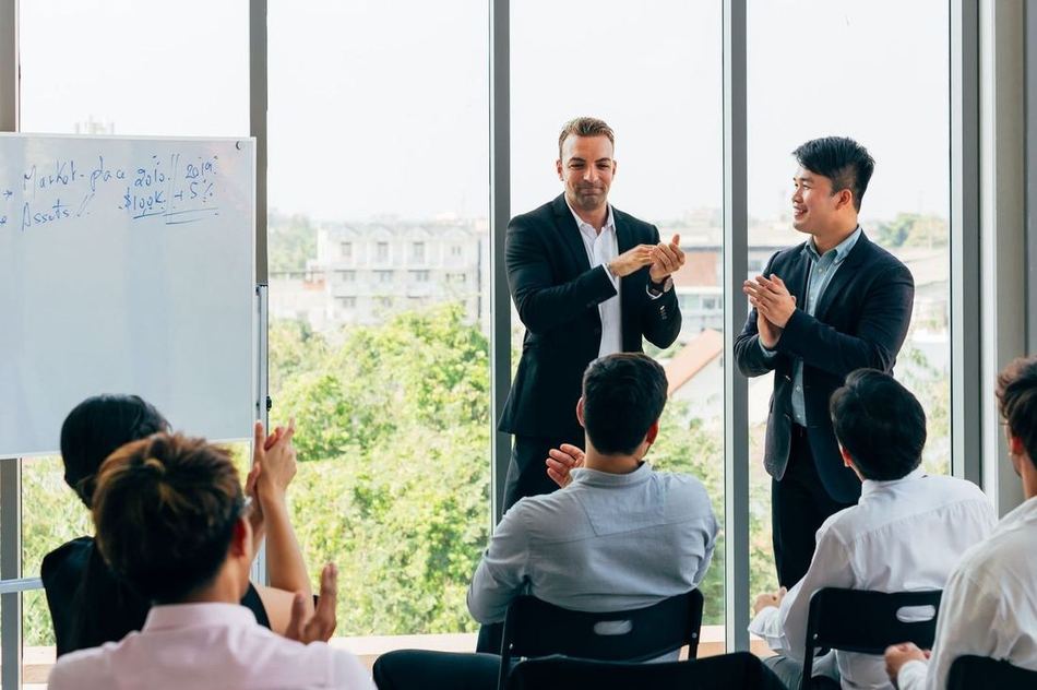 The Elite Commerce Solutions team reviewing client accounts
